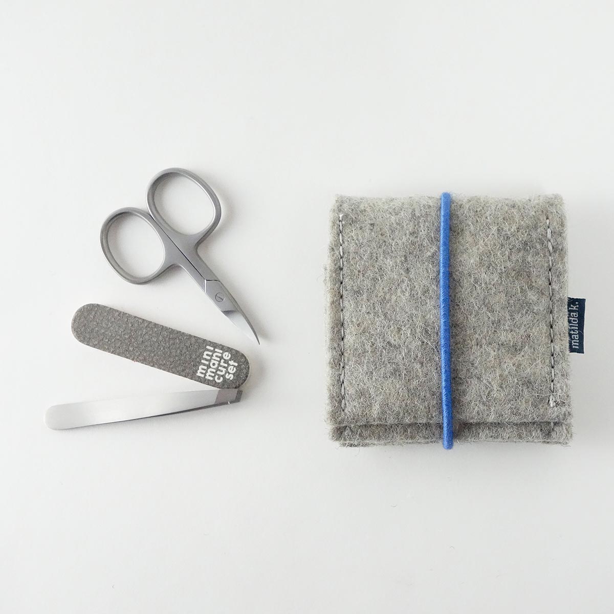 Mini Manikuere Set Aus Wollfilz Hellgrau Mit Rundgummi Mittelblau Mini Manikuere Set Aus Wollfilz Hellgrau Mit Rundgummi Mittelblau