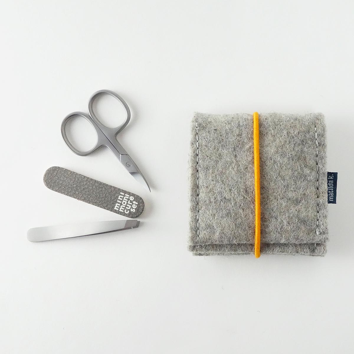 Mini Manikuere Set Aus Wollfilz Hellgrau Mit Rundgummi Orange Mini Manikuere Set Aus Wollfilz Hellgrau Mit Rundgummi Orange