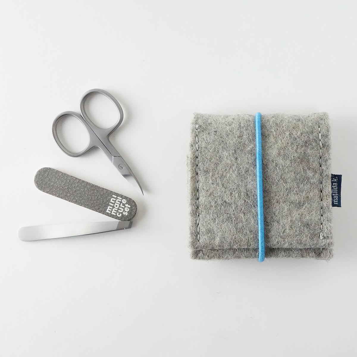 Mini Manikuere Set Aus Wollfilz Hellgrau Mit Rundgummi Tuerkis Mini Manikuere Set Aus Wollfilz Hellgrau Mit Rundgummi Tuerkis