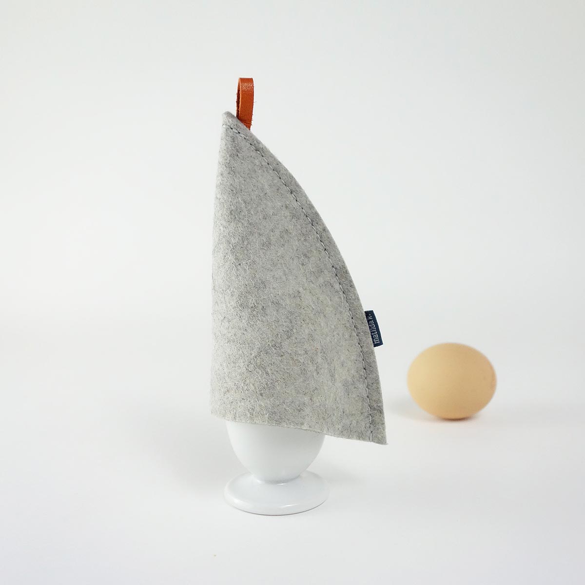 Eierwaermer Eierhuetchen Minimalistisch Lilli Aus Wollfilz Hellgrau Orange Styling Matilda K 12 eierwaermer-eierhuetchen-minimalistisch-lilli-aus-wollfilz-matilda-k